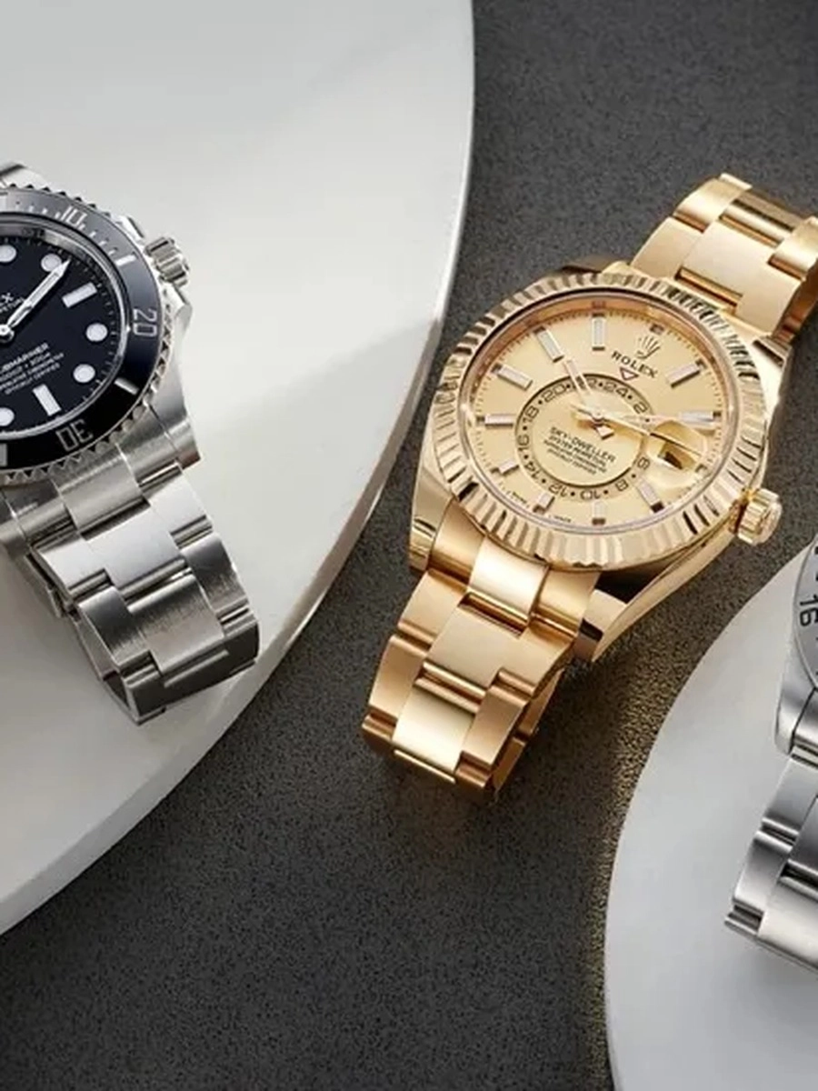 Submariner, Daytona und GMT-Master Super Clone Rolex Uhren auf dunklem Hintergrund