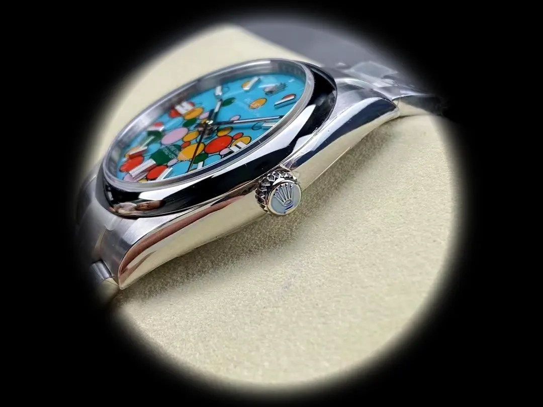 Rolex Oyster Perpetual 124300 Schweizer Klon Zifferblatt in celebration-motiv, türkisblau — Lünette-Makro